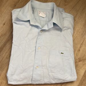 Mens Lacoste size 42 long sleeved soft blue button up dress shirt. EUC